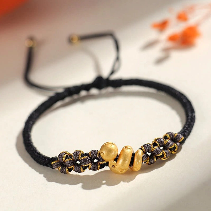 Black string 999 sterling silver snake charm bracelet product view