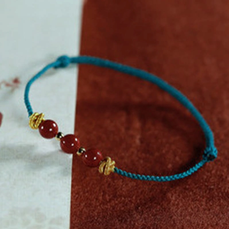 Minimalist lake blue cinnabar bracelet oblique flat view
