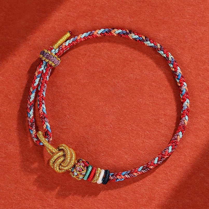 Blue colorful handwoven protection bracelet with vibrant threads and adjustable design