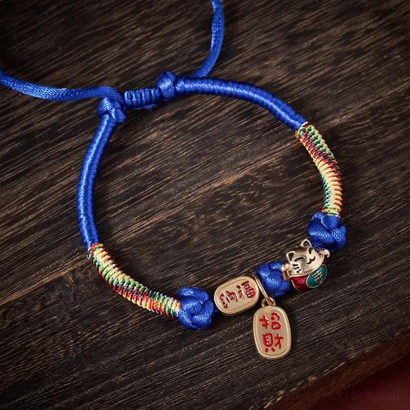 Blue plaited pet collar with adjustable closure and multicolor braided rope sections