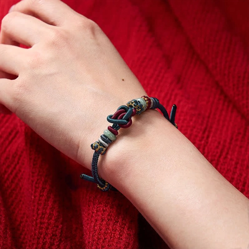Blue red hand-woven jade bracelet with heart knot and authentic craftsmanship