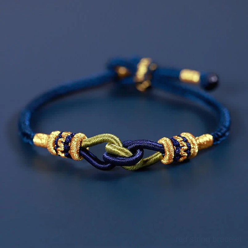 Handmade navy blue braided string bracelet with gold woven knots adjustable buckle