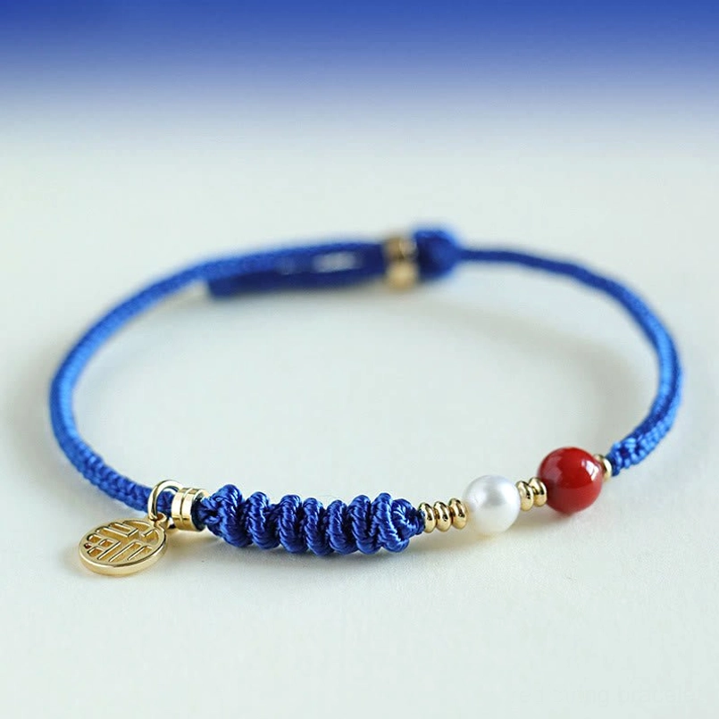 Blue string south red agate bracelet with Chinese Fu character lucky charm