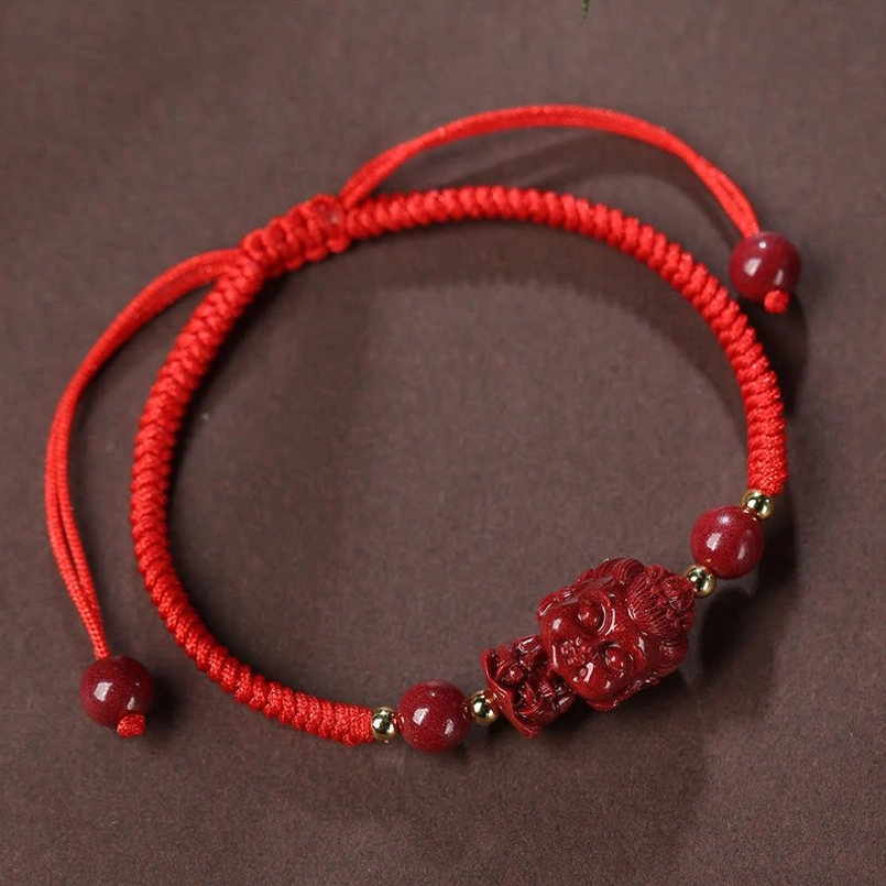 Cinnabar bodhisattva red string bracelet spacer beads flat lay