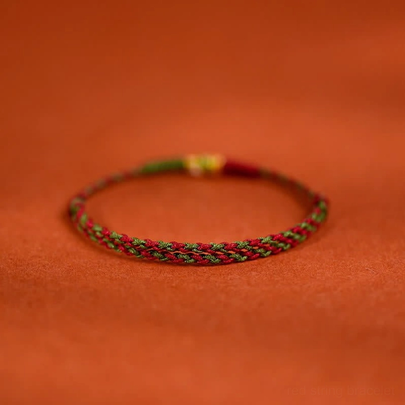 Koi fish themed red green braided cord luck bracelet center charm
