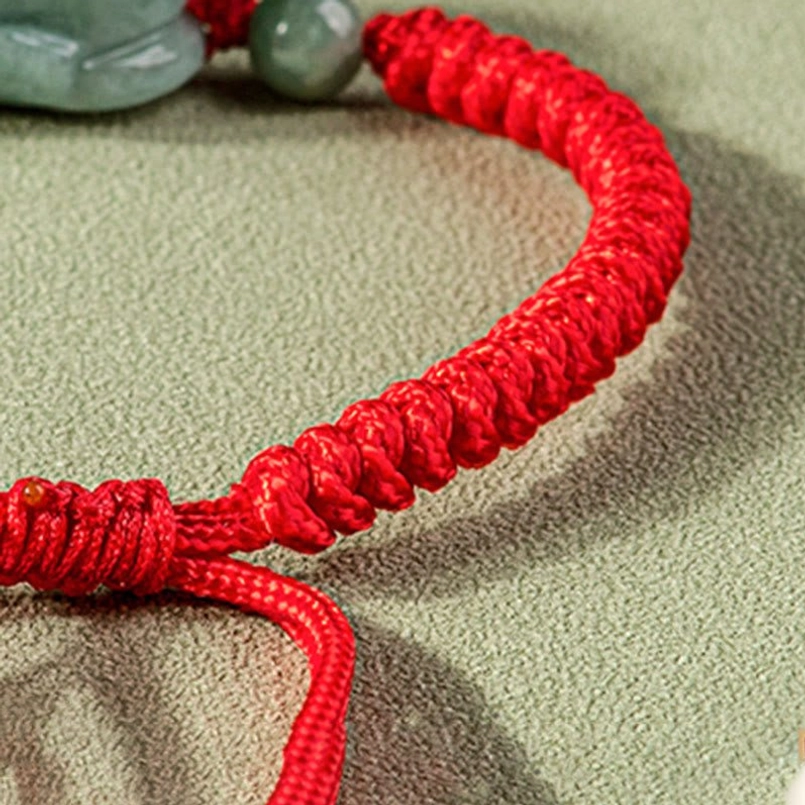 Braided cord knot detail with long adjustable rope tails, side view photography