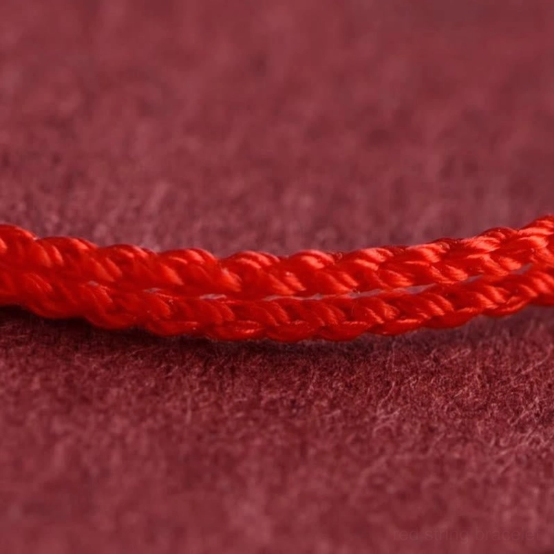 close-up braided red cord texture on lucky fortune bracelet