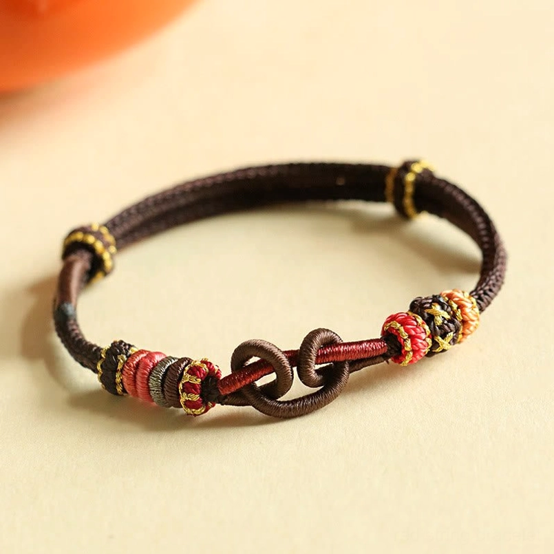 Brown Rope Ingot Pattern Braided Protection Bracelet Flat Lay