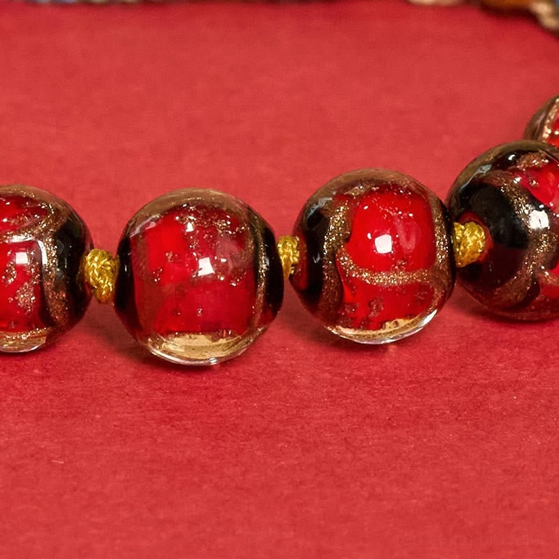 Tibetan Buddha eye protection bracelet with braided cord and metal framed pendant