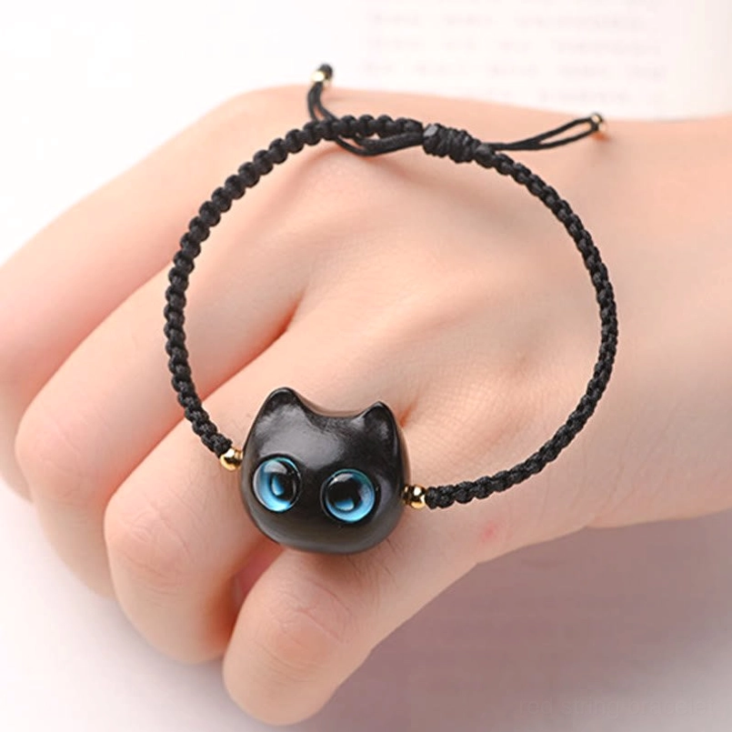 Handmade cat head red string bracelet with natural wood finish