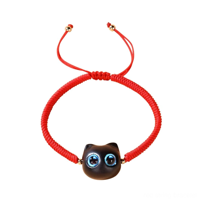 Cat head pattern bracelet showing intricate weaving and ebony wood bead