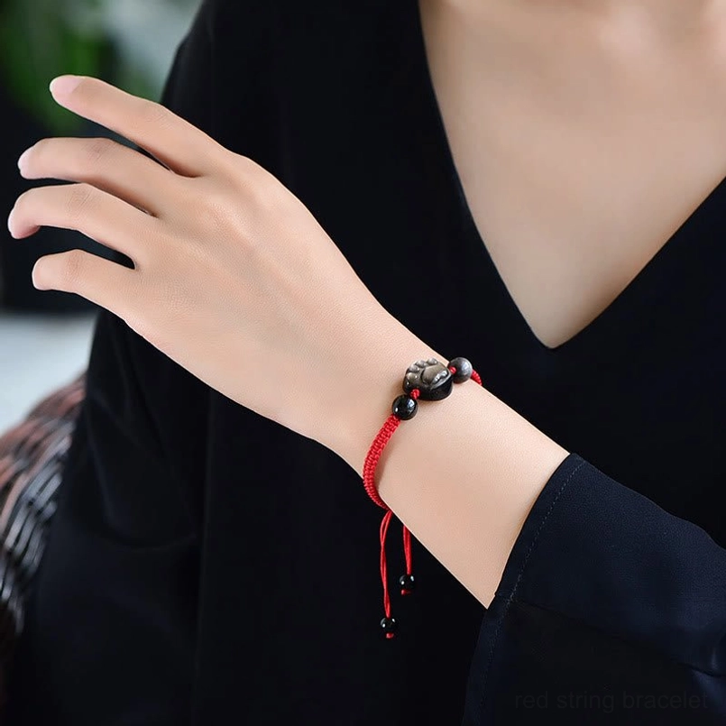 Cat paw obsidian red string bracelet worn on female wrist fashion