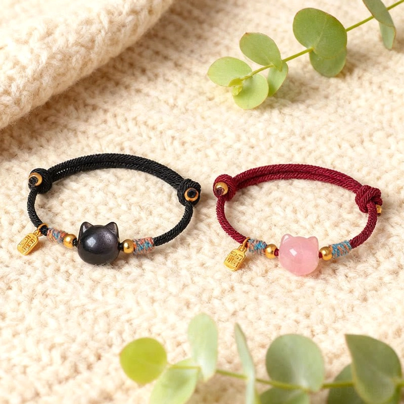 Wearable fu character cat protection bracelet on wrist showing proper fit and styling