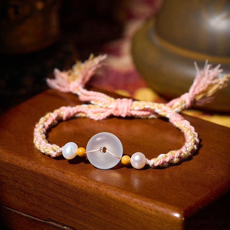 Flat Lay Chalcedony Peace Buckle Bracelet with Tassels on Wooden Box
