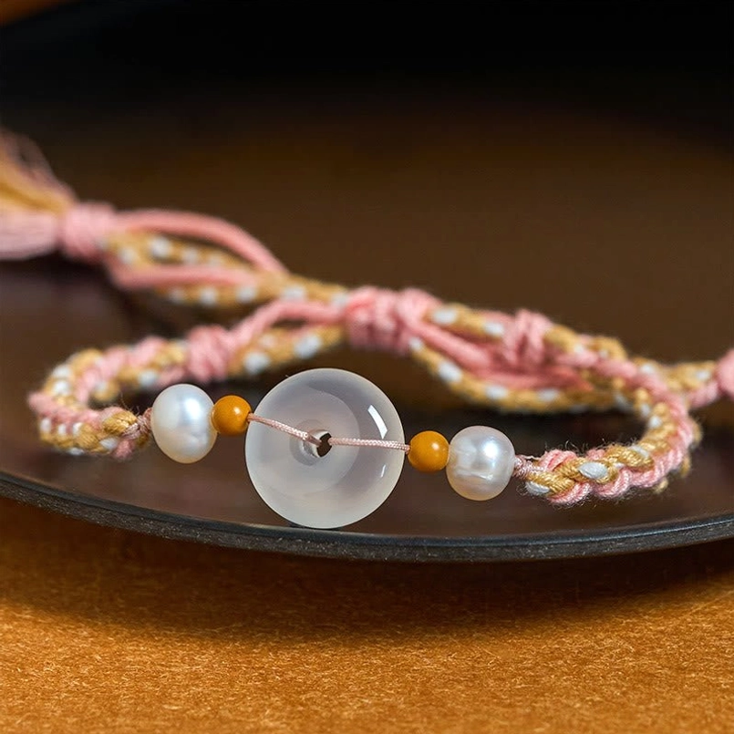 Close Up Side View of Chalcedony Peace Buckle Bracelet on Ceramic Plate