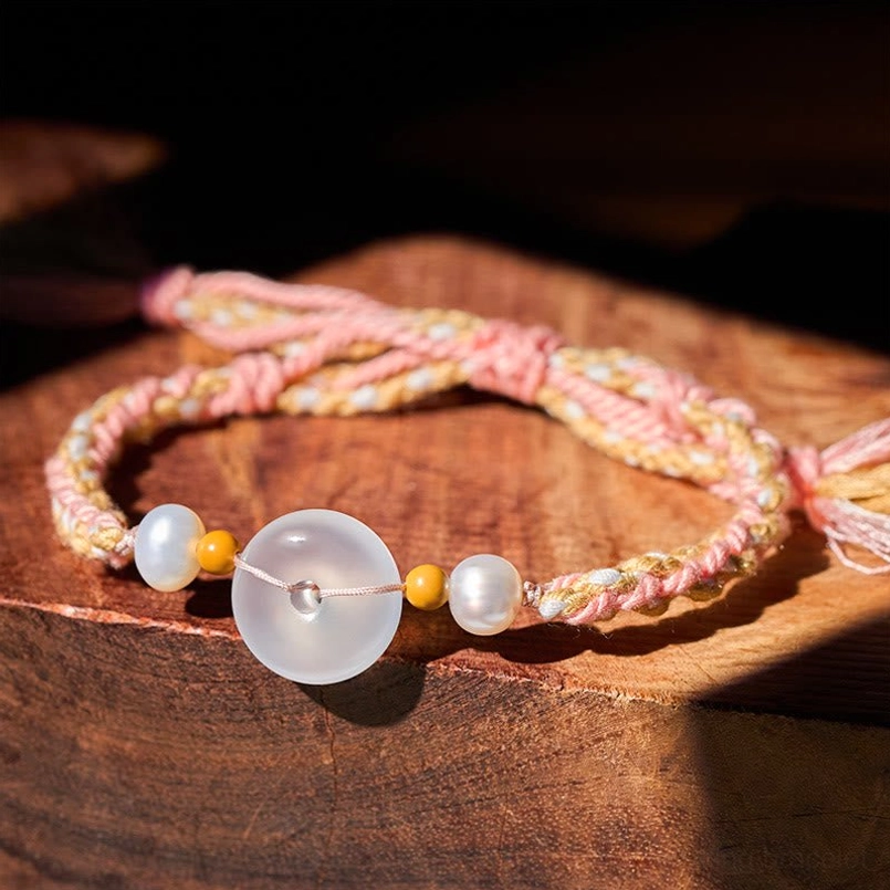 Chalcedony Peace Buckle Red String Bracelet Main View on Wooden Table
