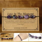 Live in the Moment Charoite Hematite red string bracelet with healing stones on wooden display
