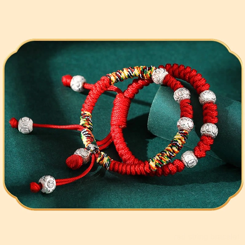 Children's lucky charm red string bracelet with King Kong knot, silver beads, and protective spiritual symbolism