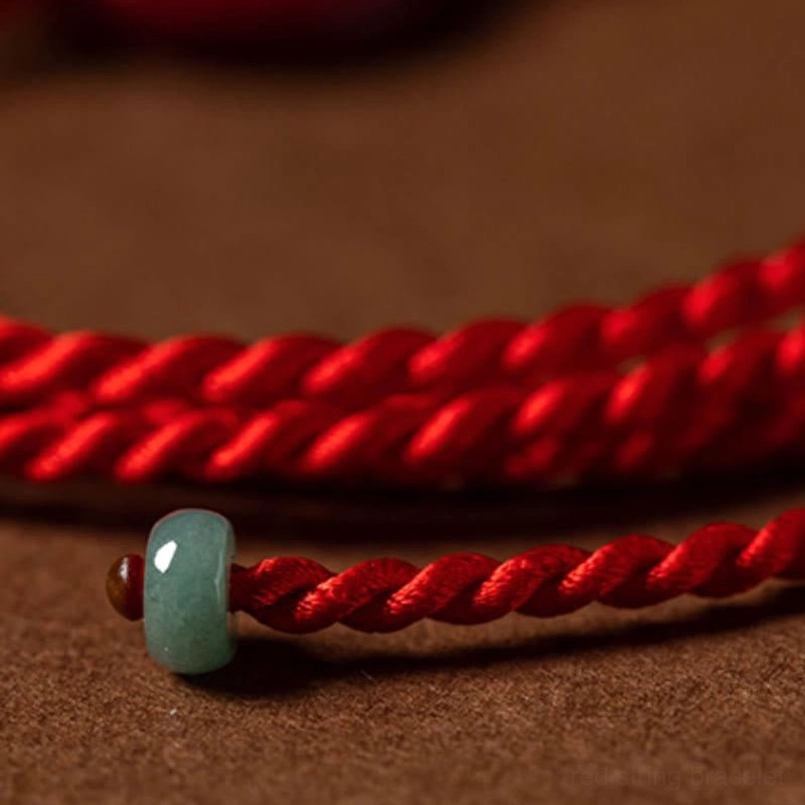 Natural cinnabar peace buckle belly chain styled with casual denim - everyday wear inspiration
