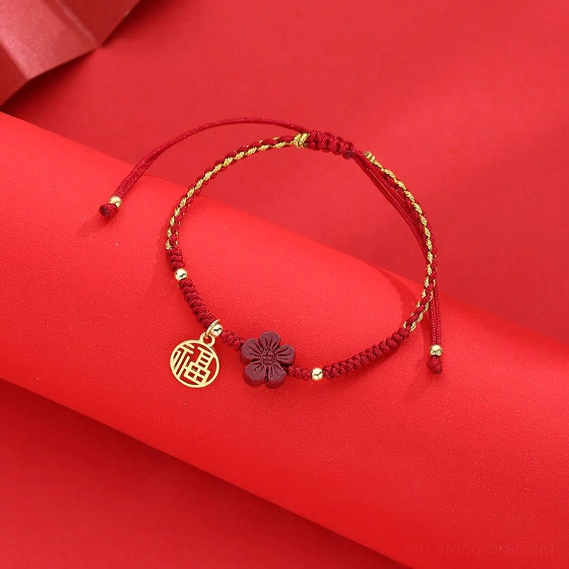 Handmade cinnabar Fu charm bracelet with red woven rope and round Fu tag
