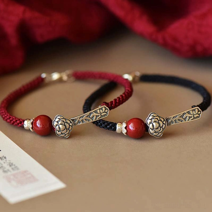 925 sterling silver cinnabar blessing bracelet set with red string and Ruyi charm flat lay display