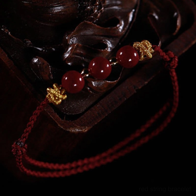 Cinnabar string bracelet unboxing scene with gift package
