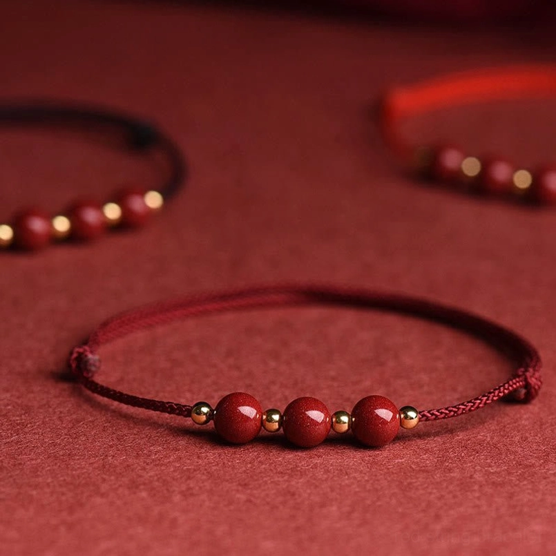 Single and three cinnabar bead bracelet comparison for choosing pattern