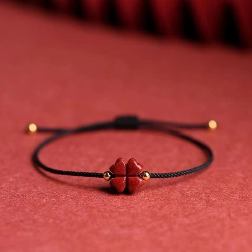Cinnabar four leaf clover red string bracelet with golden bead accent lifestyle wear view