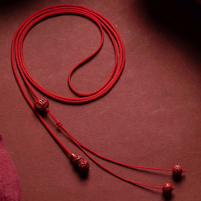 Cinnabar gourd charm belly chain highlighting protective talisman and spiritual design