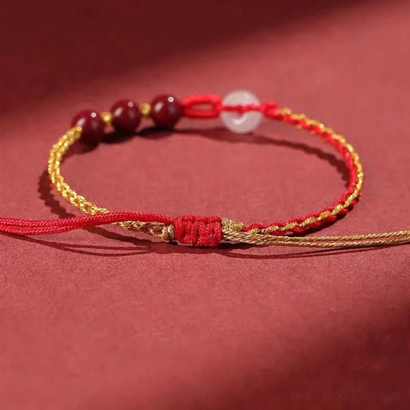 Cinnabar jade peace buckle bracelet centered front view with braided knot detail