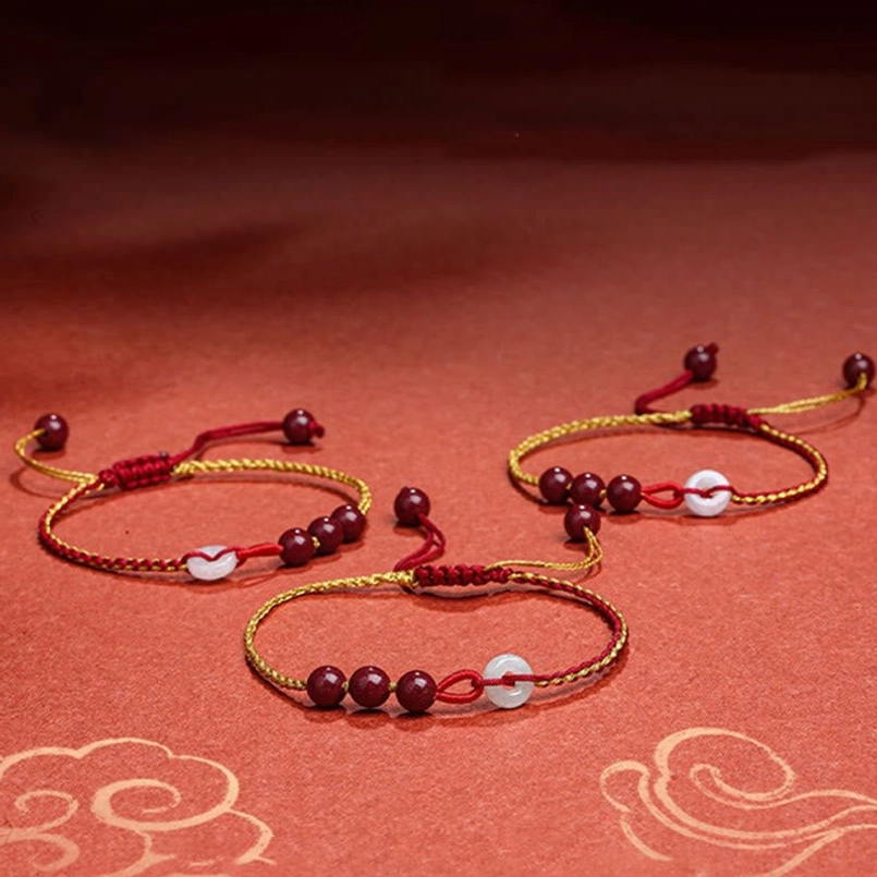 Cinnabar jade peace buckle bracelet red-gold braided cord detail