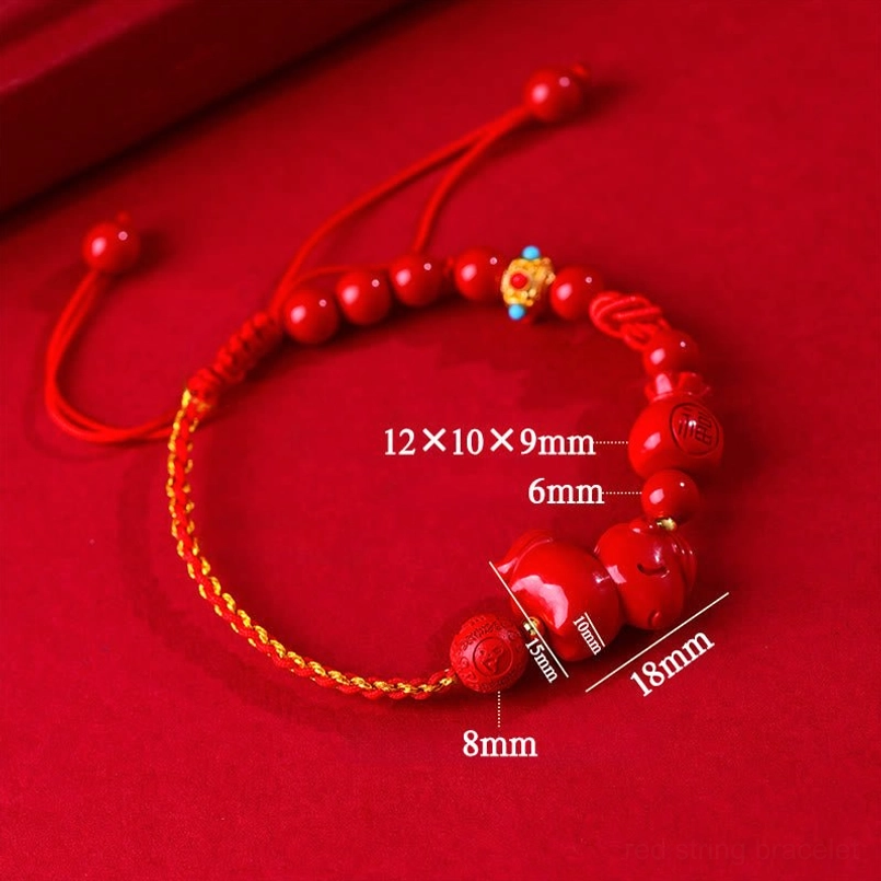 Cinnabar lucky bracelet with size measurement marks on dark red background