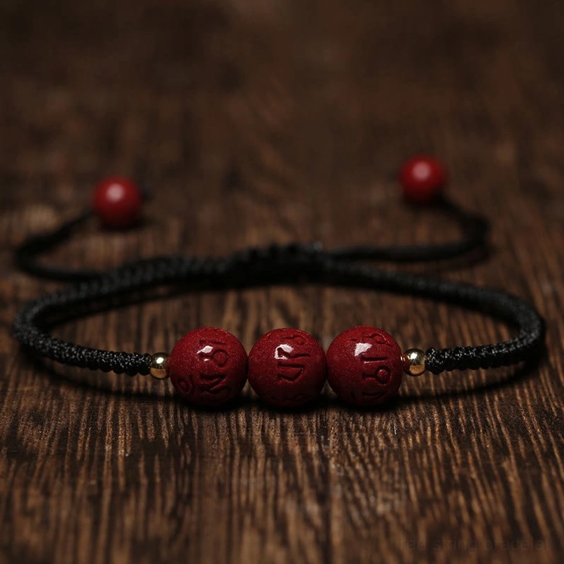 Cinnabar Om Mani Padme Hum blessing bracelet with black cord protective energy