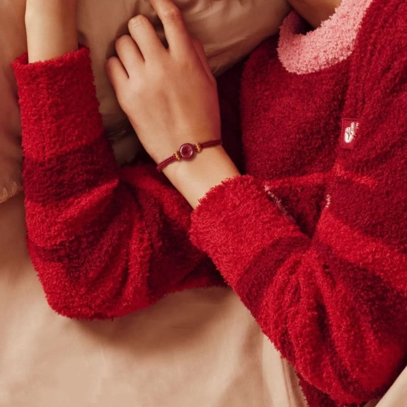 Cinnabar peace buckle bracelet adjustable sliding closure detail