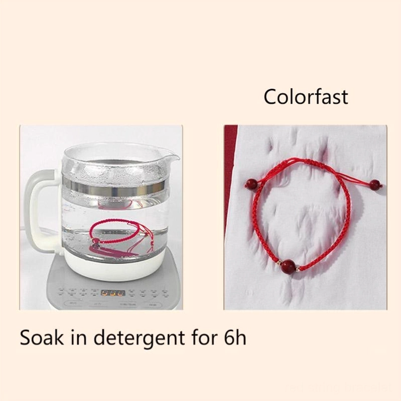 Cinnabar red string bracelet protection blessing with metal spacers flat lay