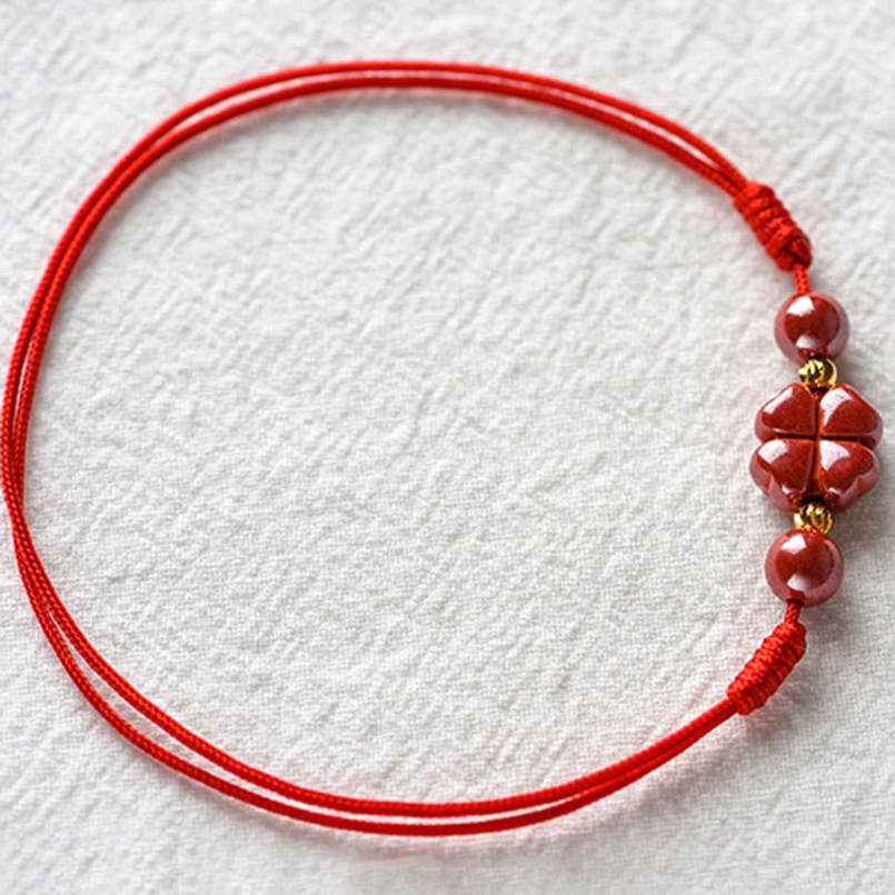 Four leaf clover cinnabar red string bracelet wrist wear styling on wrist