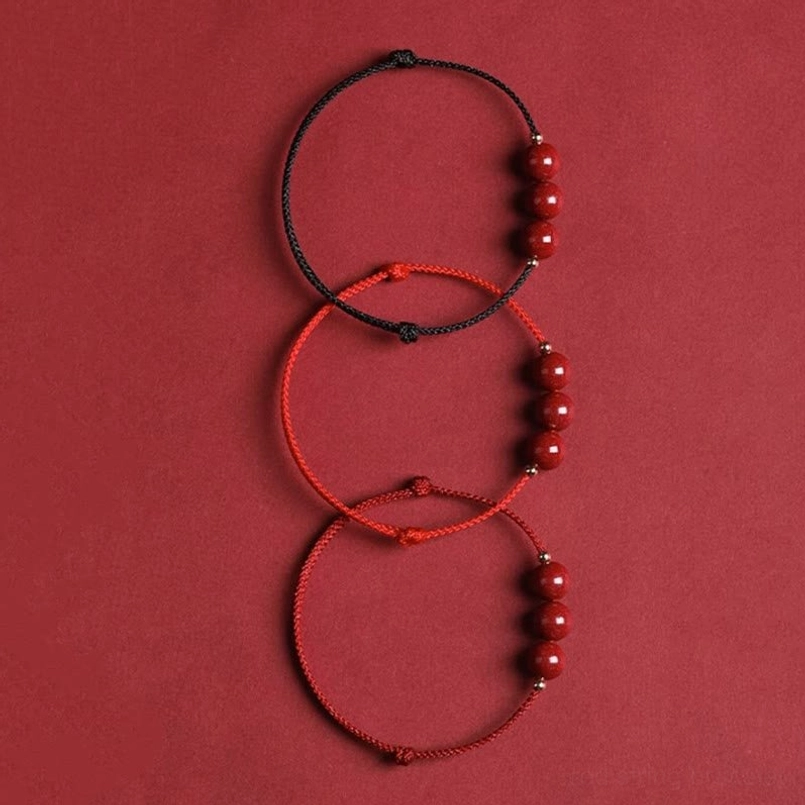 Cinnabar red string fate protection bracelet spiritual significance