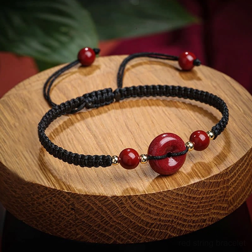 Red string cinnabar peace buckle protection bracelet product showcase