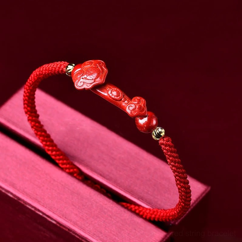 Cinnabar Ruyi red braided bracelet with adjustable knot in gift box packaging