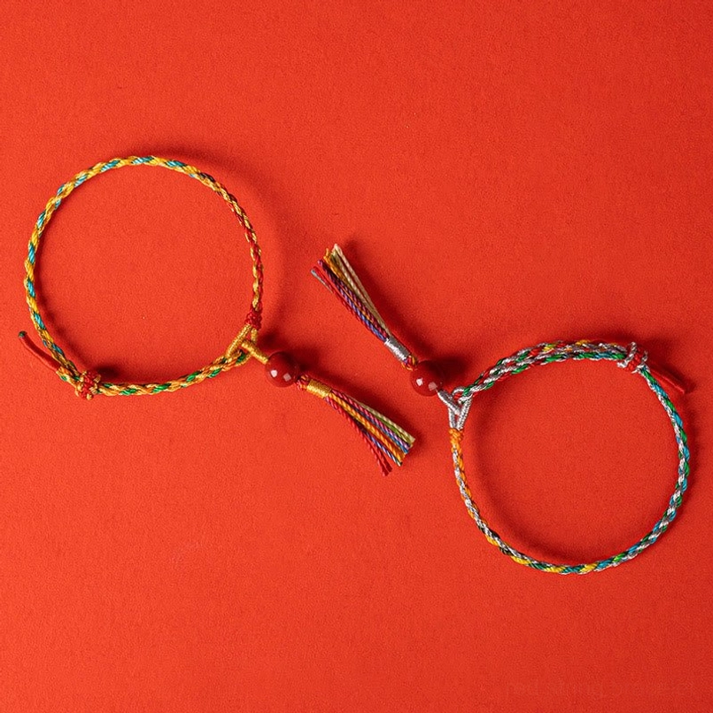 Lifestyle shot of Tibetan cinnabar protection bracelet on wrist