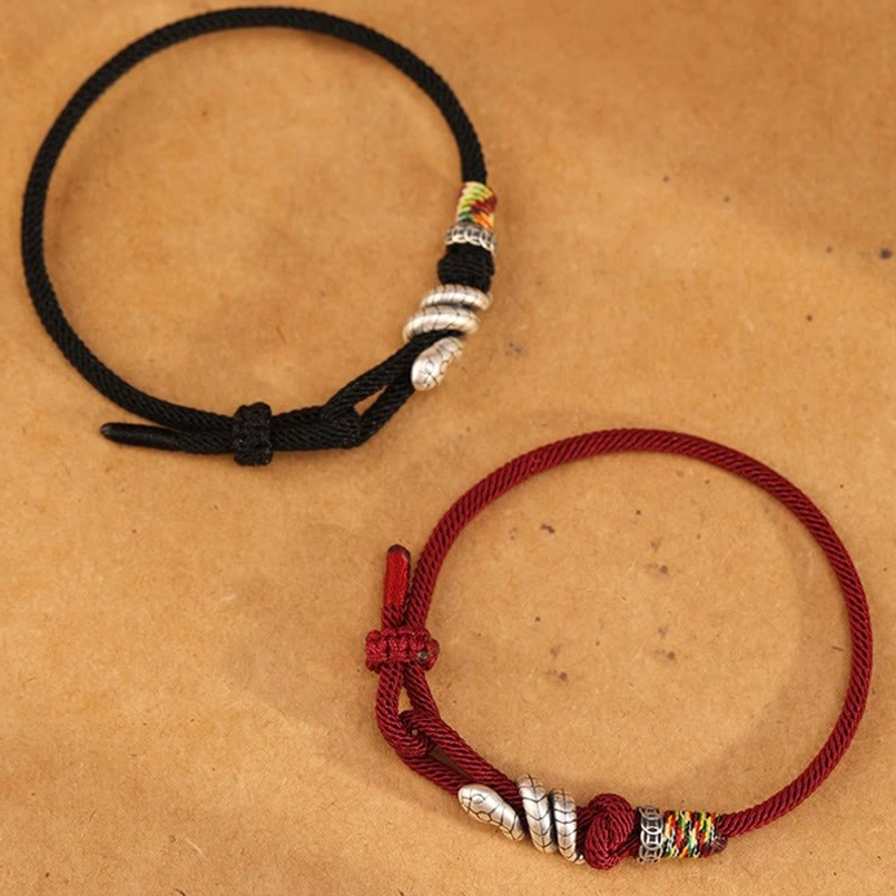 Red string snake bracelet in classic red shade with 925 sterling silver serpent charm pendant