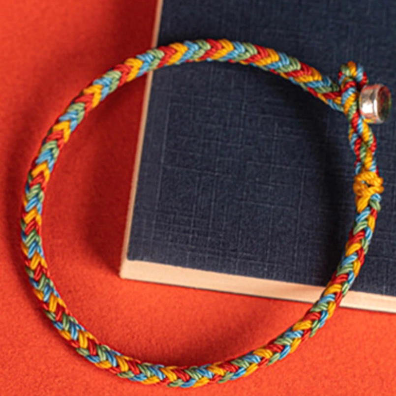 Close Up Oblique View Twisted Multicolor Luck Red String Bracelet