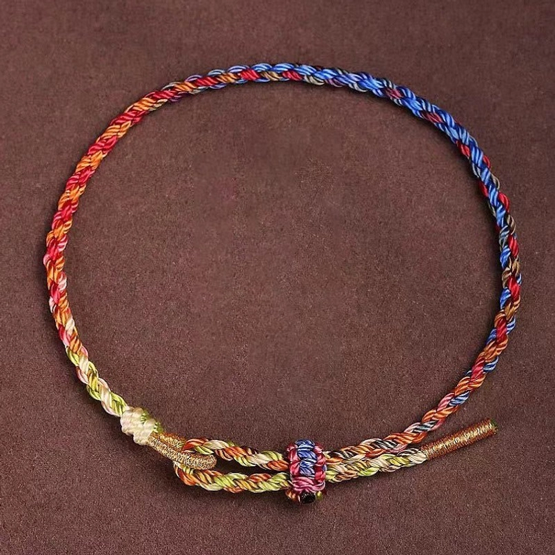 Multicolor dragon boat festival lucky bracelet with woven decorative knot and golden rope ends