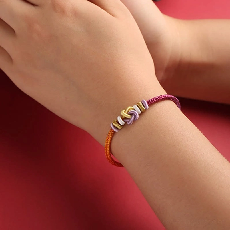 Wearable colorful string bracelet on wrist showing comfortable fit and multi-tone design
