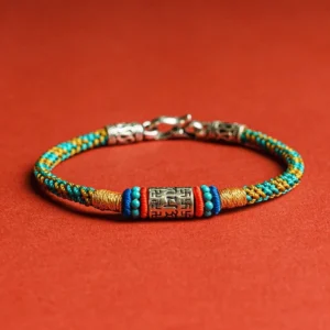 Colorful Tibetan six true words 925 sterling silver bracelet flat lay on red background