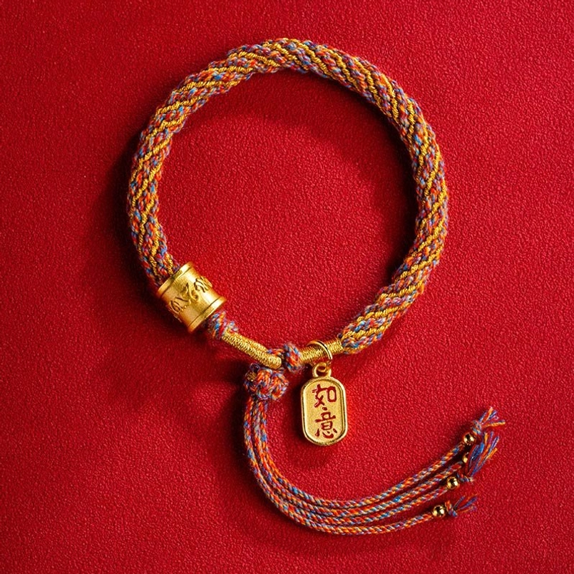 Complete Tibetan woven Om Mani Padme Hum Ruyi lucky bracelet with multicolor braided rope flat lay