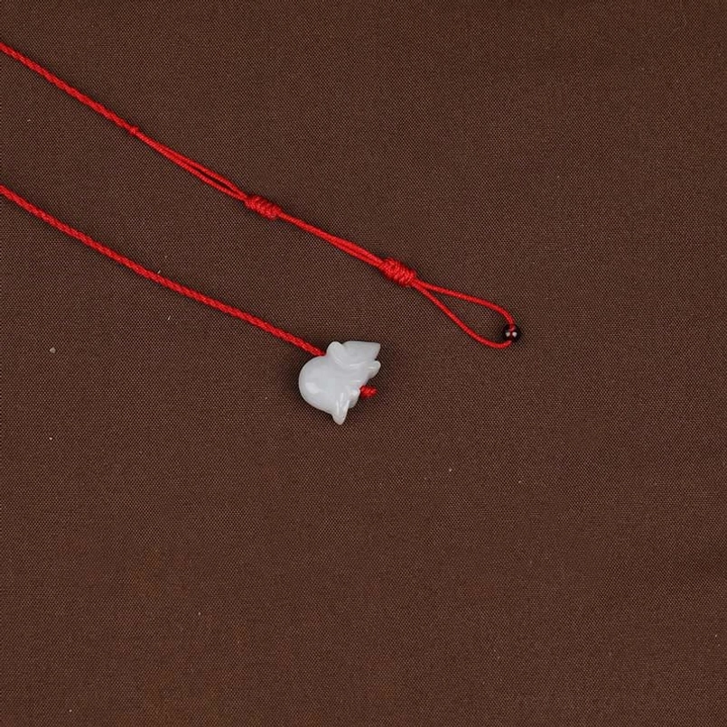 Complete red string belly chain with garnet gemstones, jade charm and zodiac peace buckle