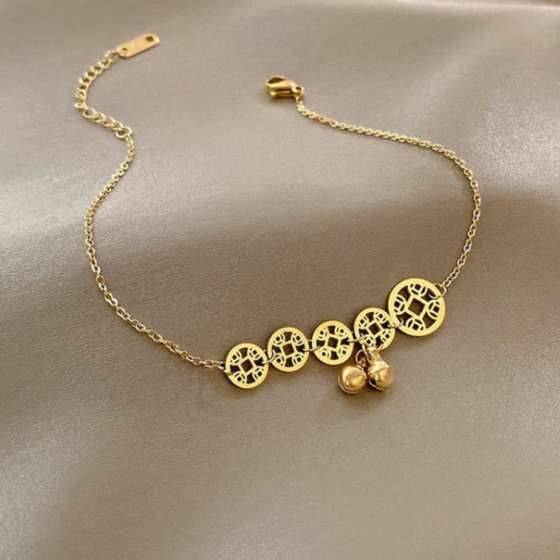 Adjustable copper coins bell anklet showing extension chain and bell pendants