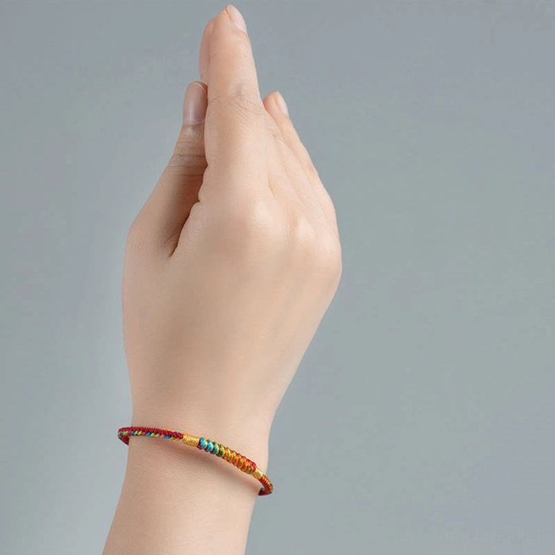 Couple matching multicolor red string protection bracelets flat lay shot