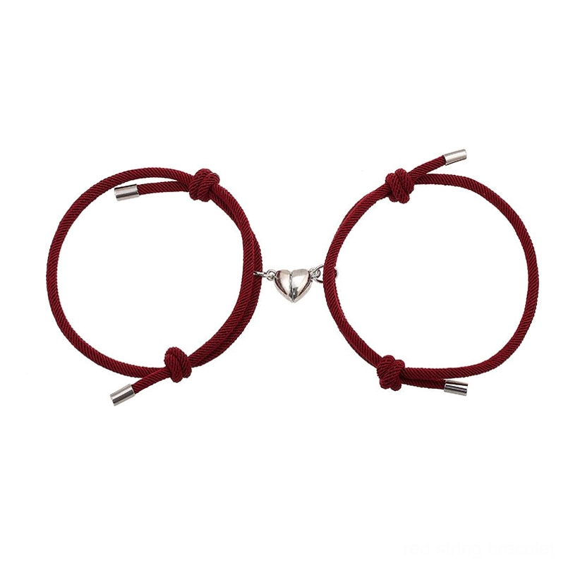 Couple red string bracelets lifestyle photo, wearing and matching connection